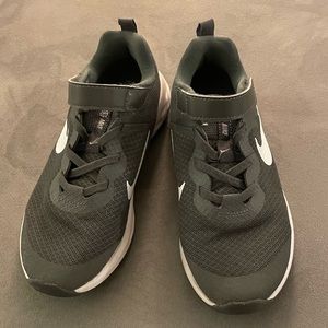 Kids’ gray Nike sneakers